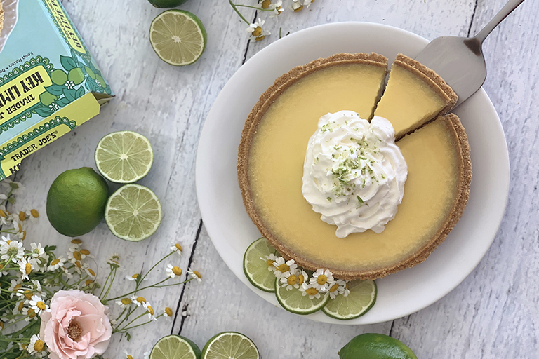 Trader Joe's Key Lime Pie topped with whipped cream and lime zest