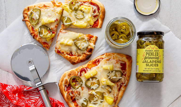 Spicy Naan Pizza topped with Trader Joe's Pickled Fermented Jalapeño Slices
